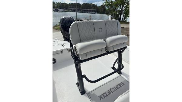 2025 Sea Fox 251 Bay Fox boat seating with lake view in background.