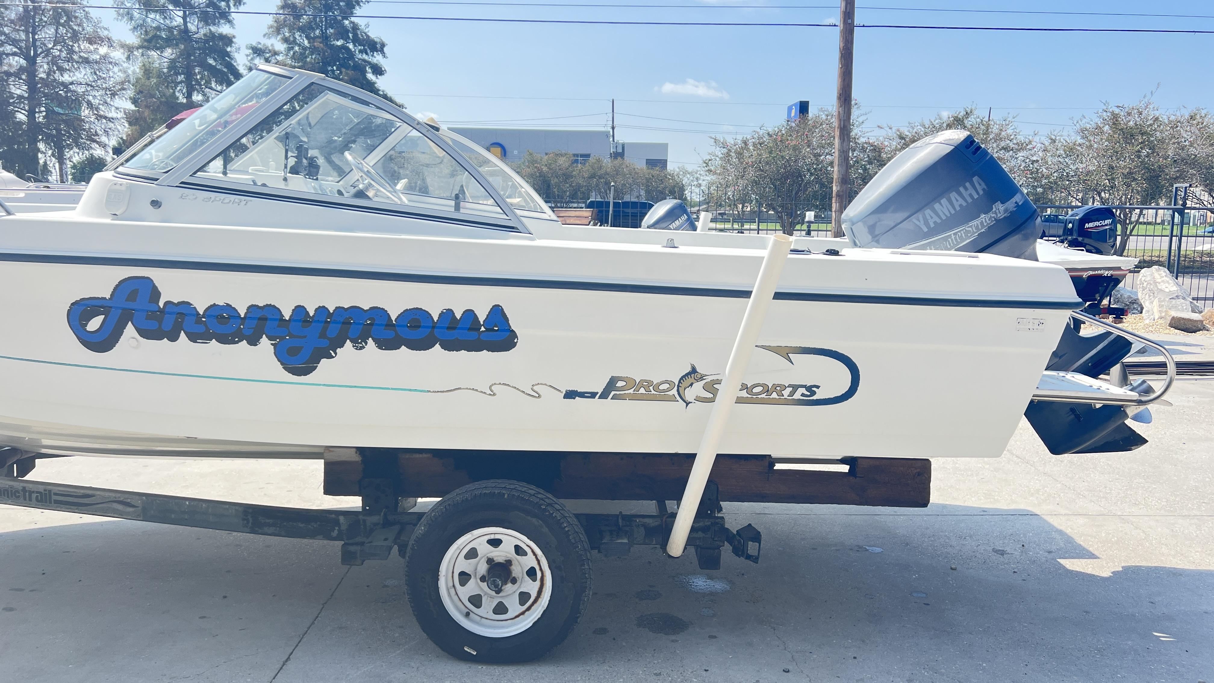 1998 Pro Sports Walk Through boat on trailer with Yamaha motor, labeled "Anonymous."