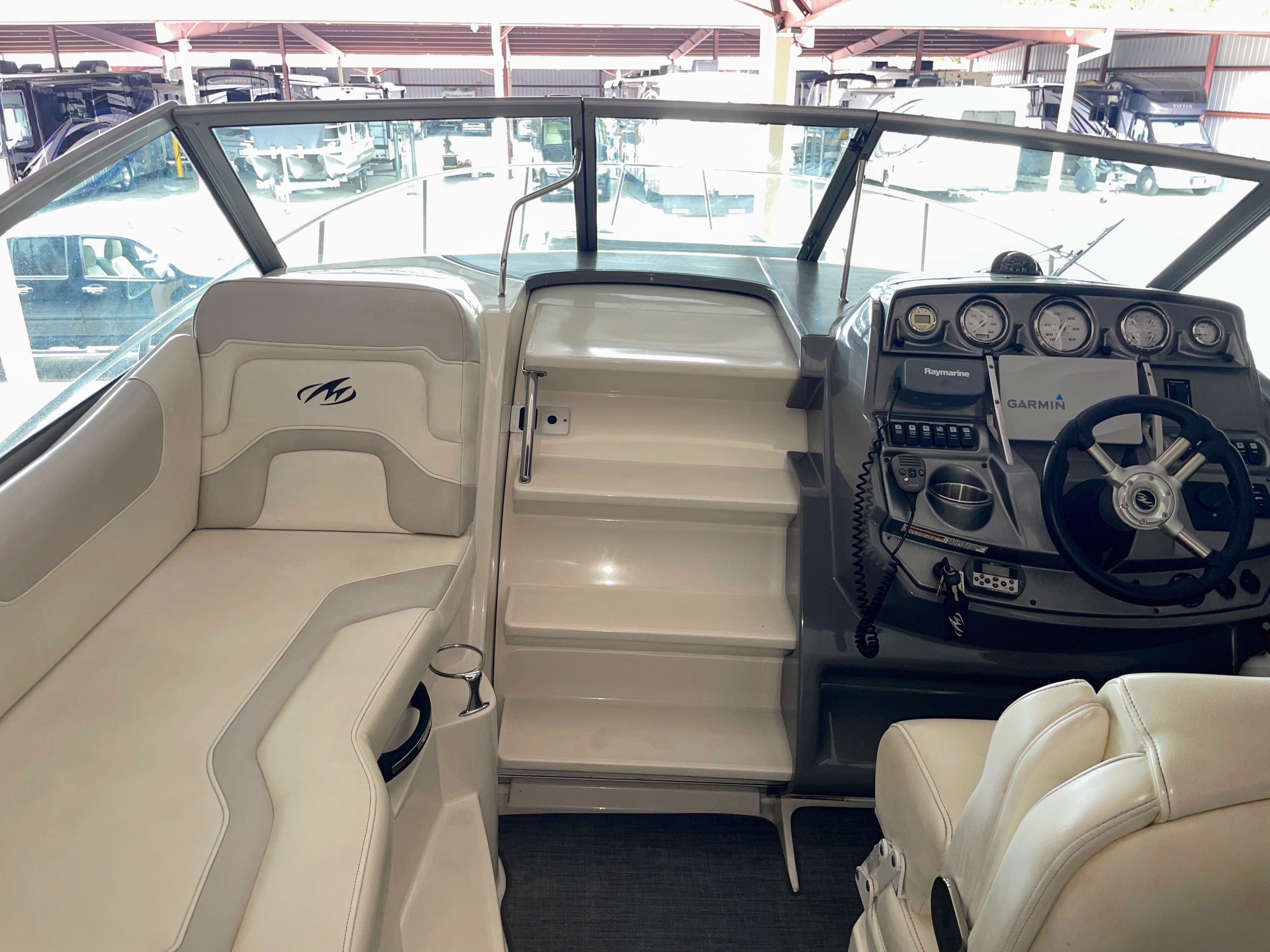 Interior of 2010 Monterey 280 Sport Cruiser with helm console.