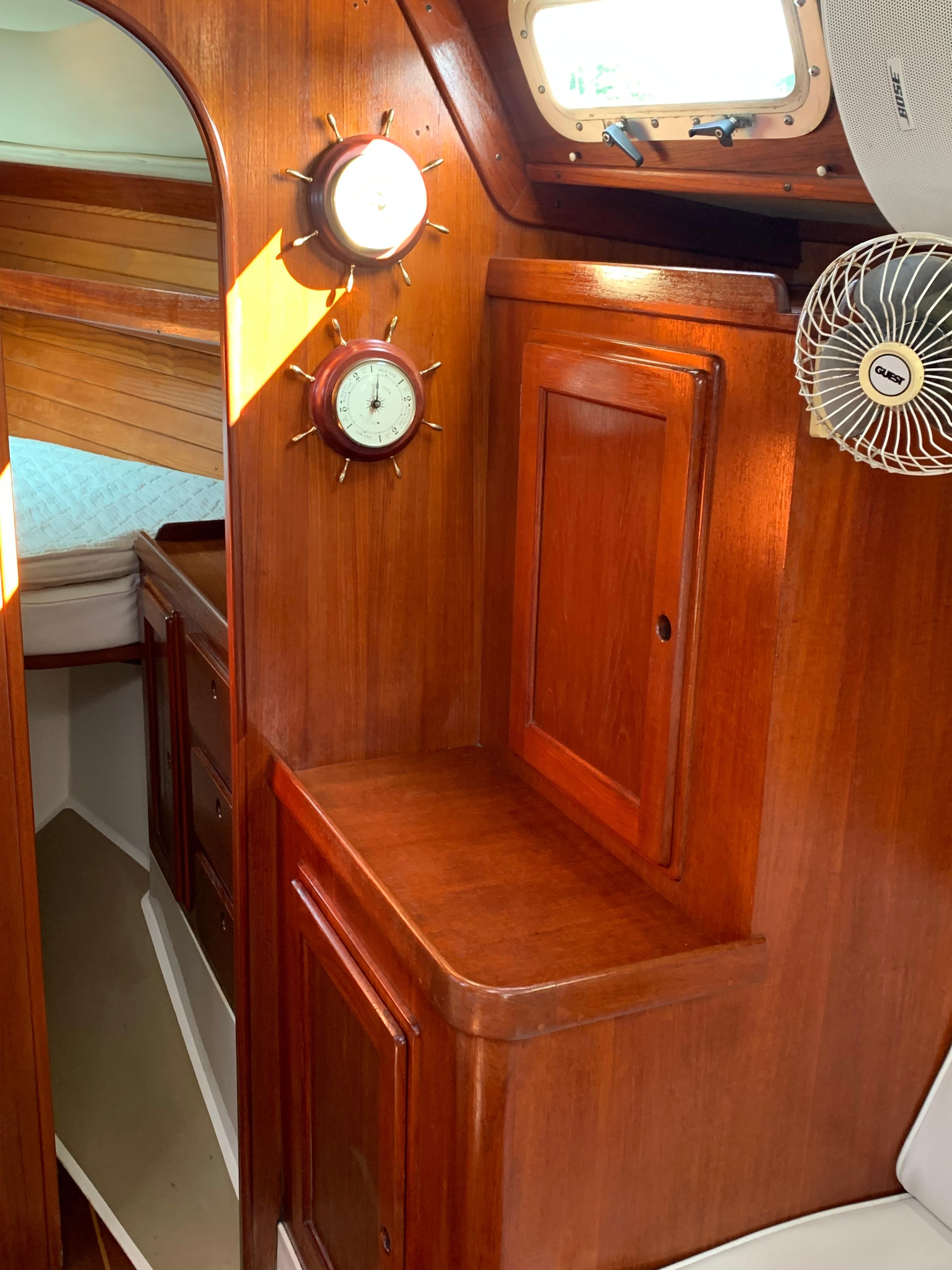 Interior of a 1990 Freedom 38 yacht with wooden cabinetry.