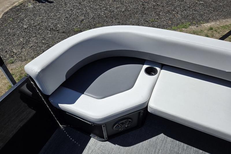 2024 Godfrey Mighty G 1476 C boat seating area with cup holder and speaker.