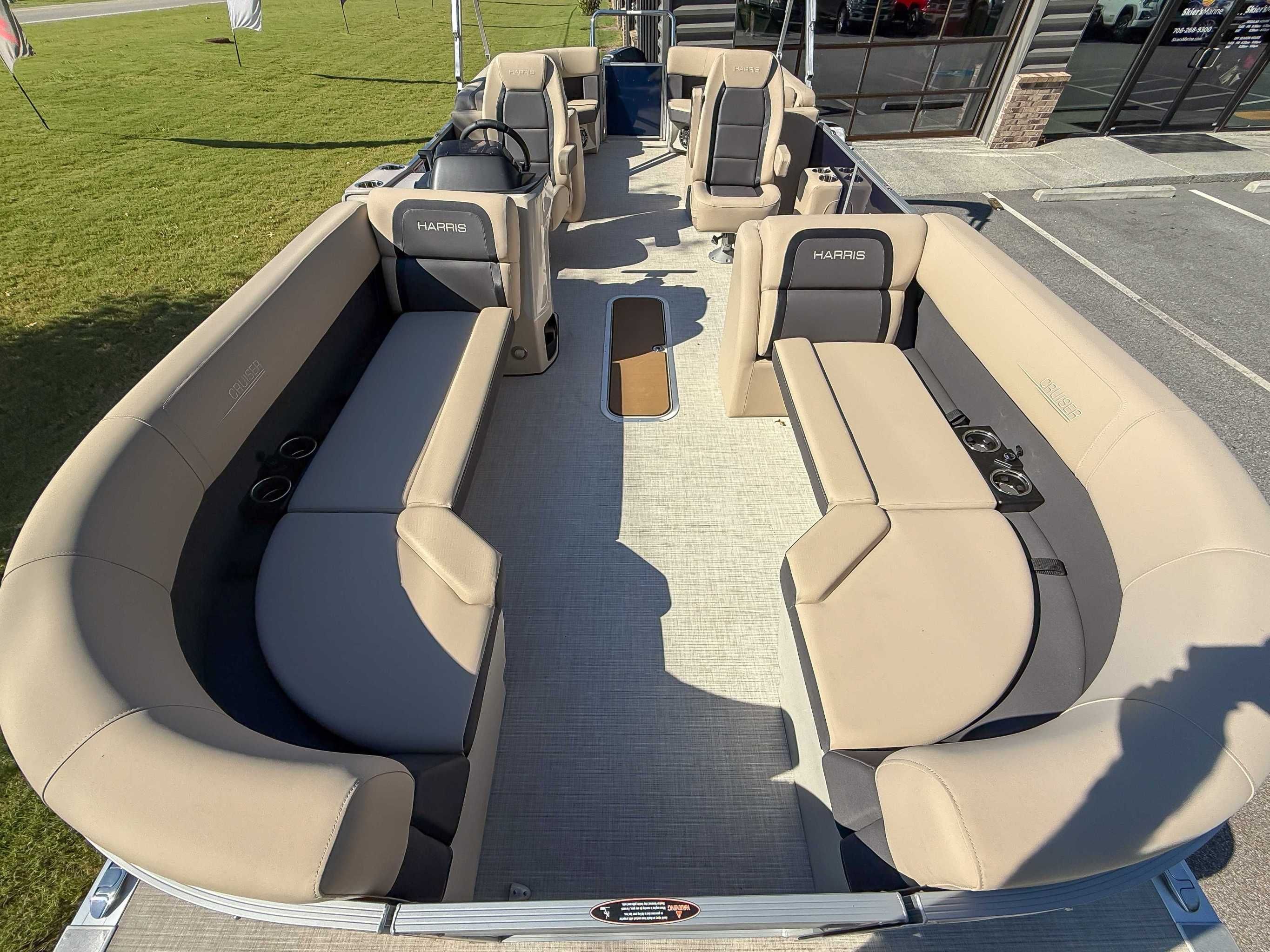 Interior view of 2025 Harris Cruiser 250 CWDH pontoon boat.