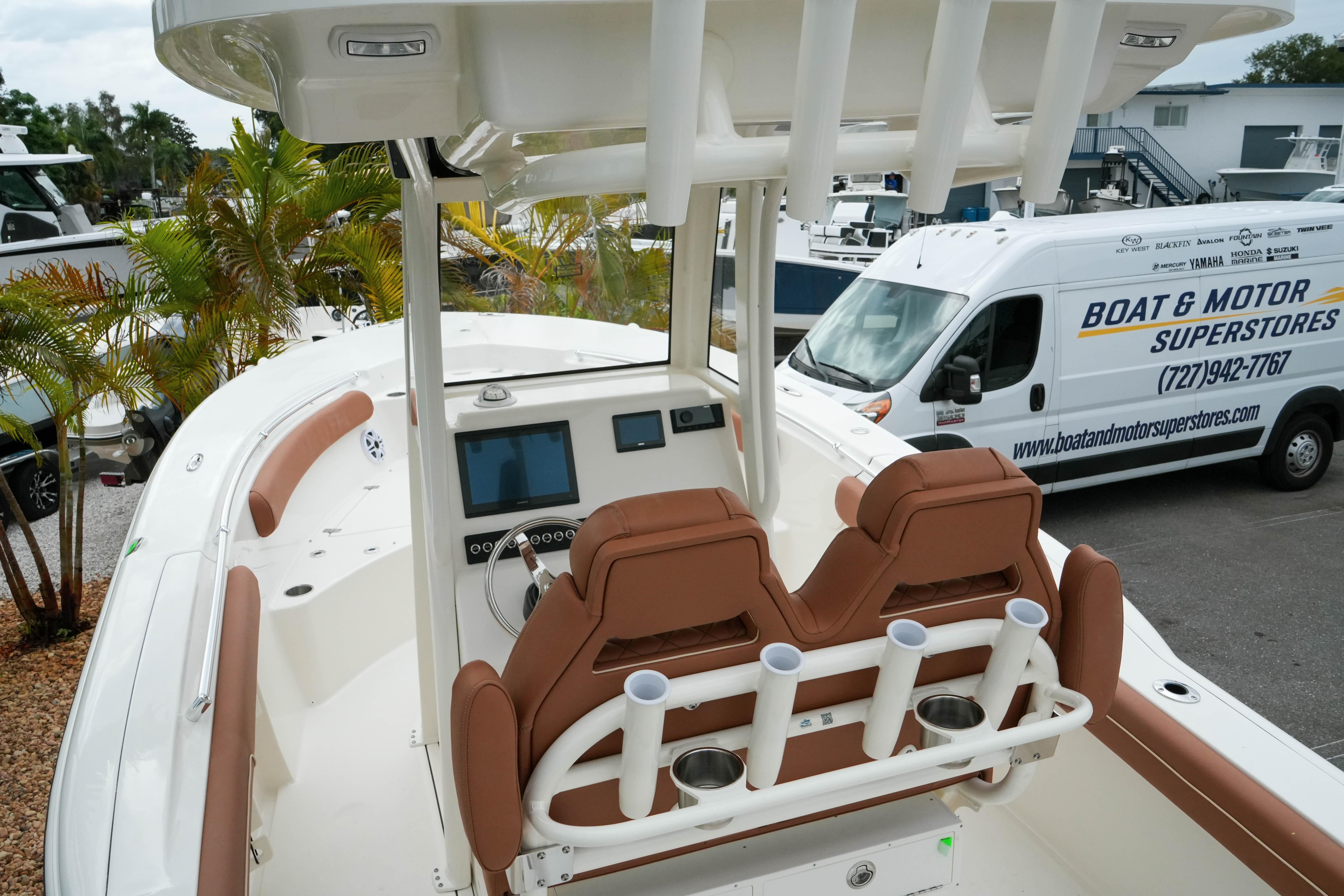 2026 Key West 244 Center Console boat with dual seats and modern dashboard.