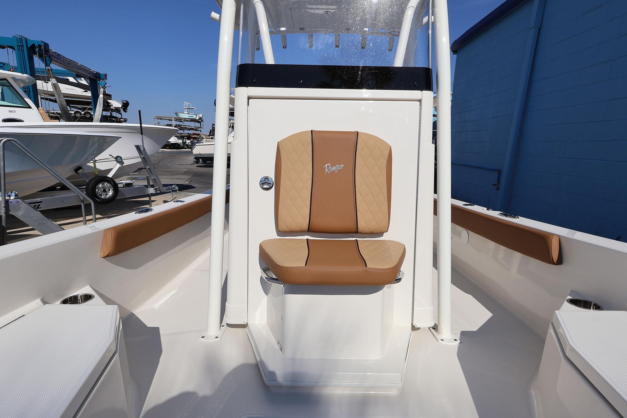 2026 Ranger 2360 Bay boat interior with tan seating and console.