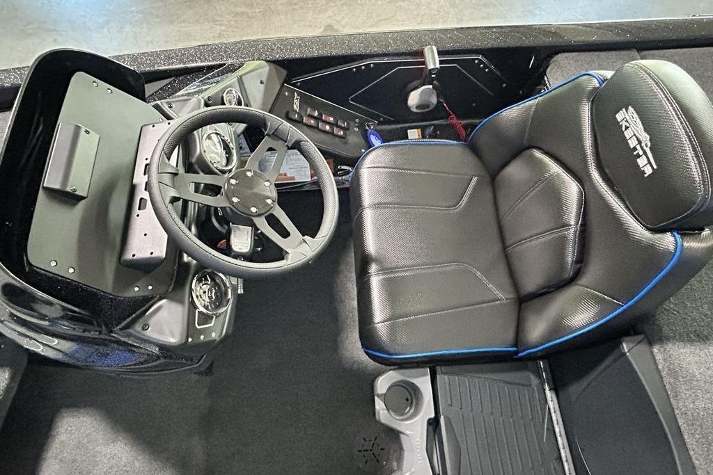2026 Skeeter ZX200 boat cockpit with steering wheel and black leather seat.