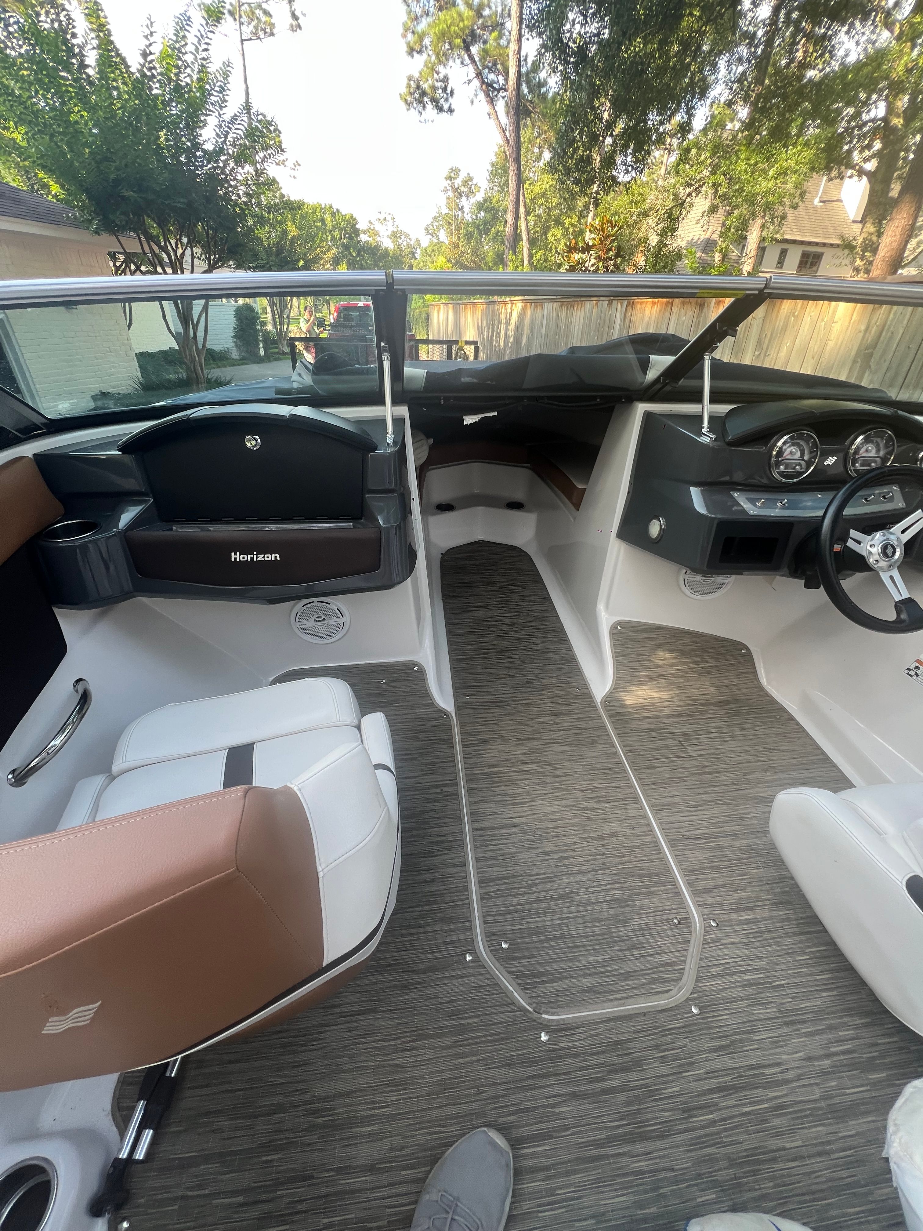 Interior of a 2017 Four Winns H230 boat with modern features.
