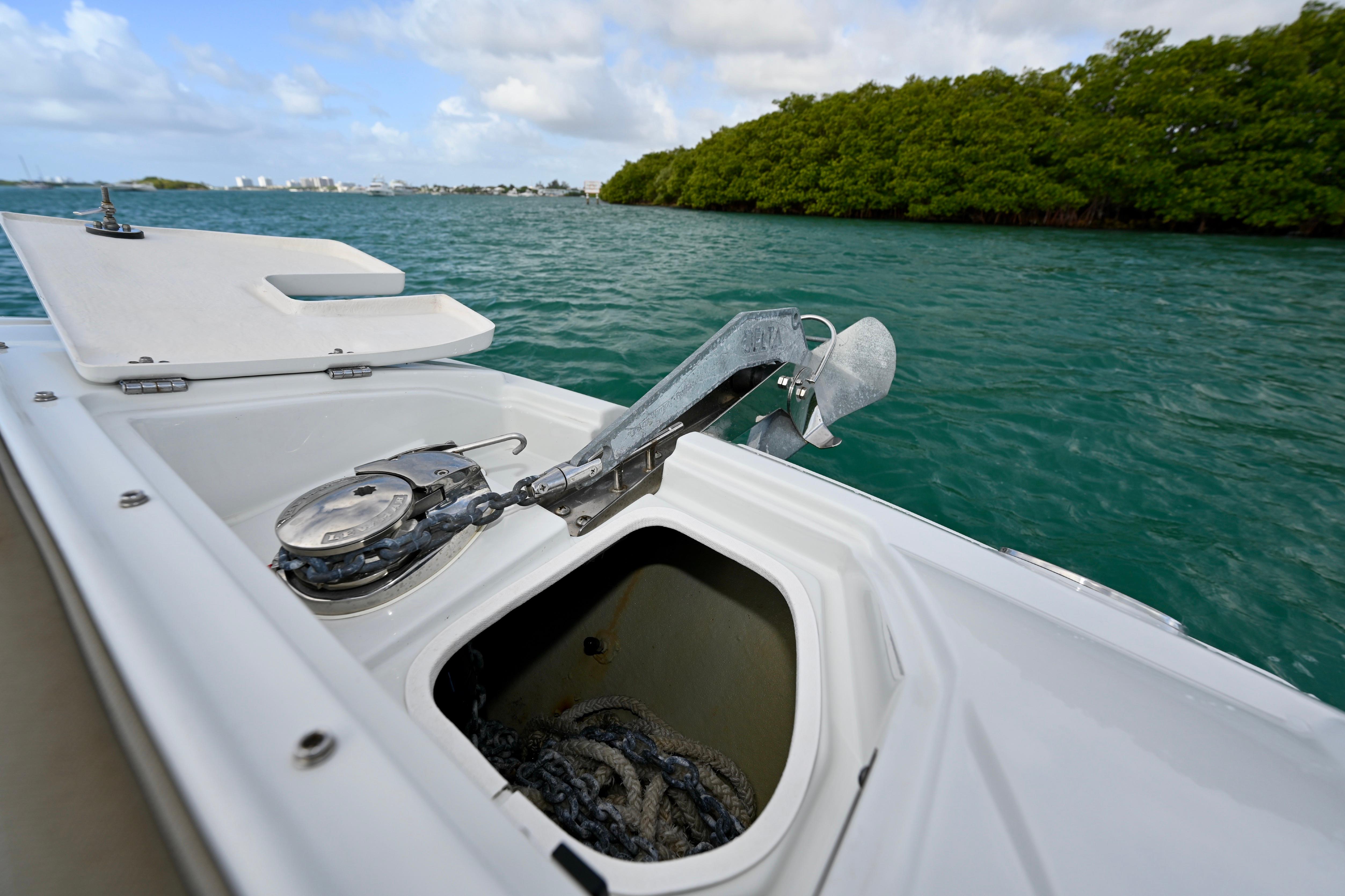 Anchor compartment of 2020 Crownline Eclipse E305 XS boat on water.
