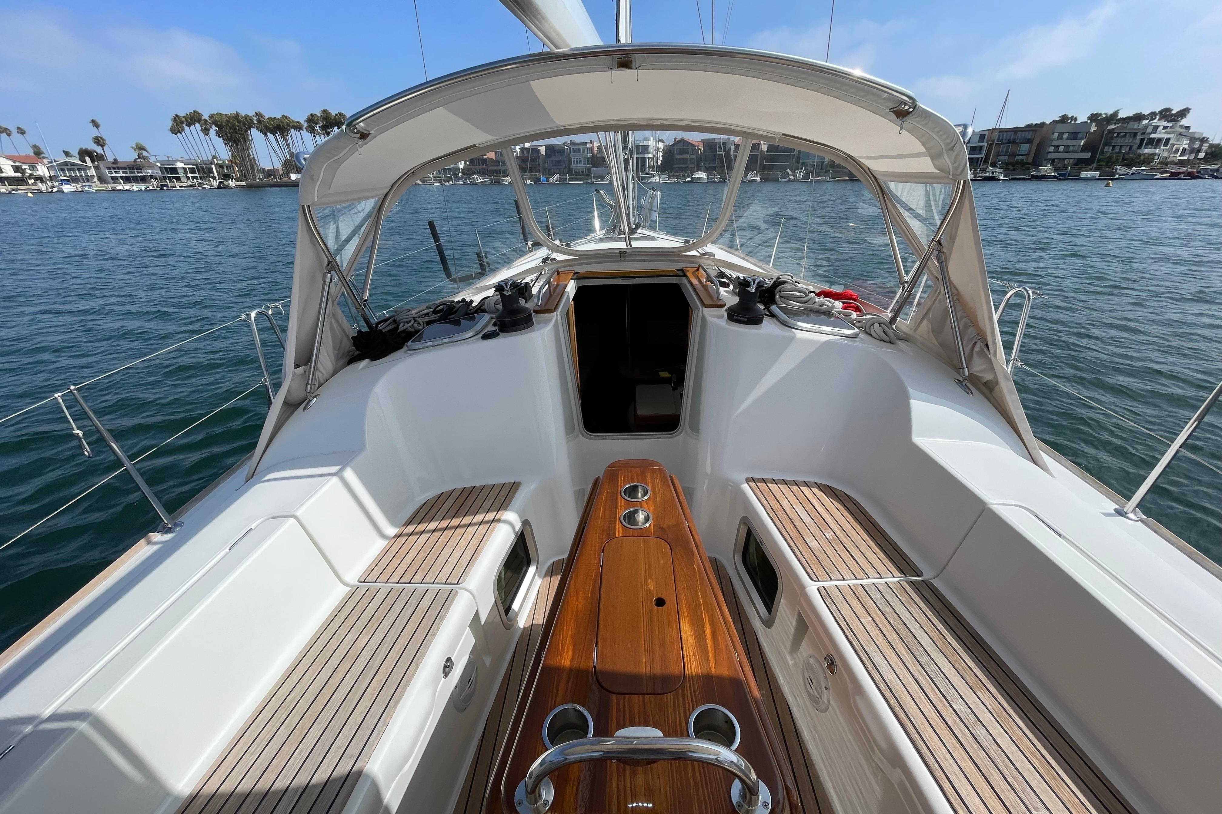 2007 Jeanneau Sun Odyssey 39 DS sailboat cockpit with teak seating and ocean view.
