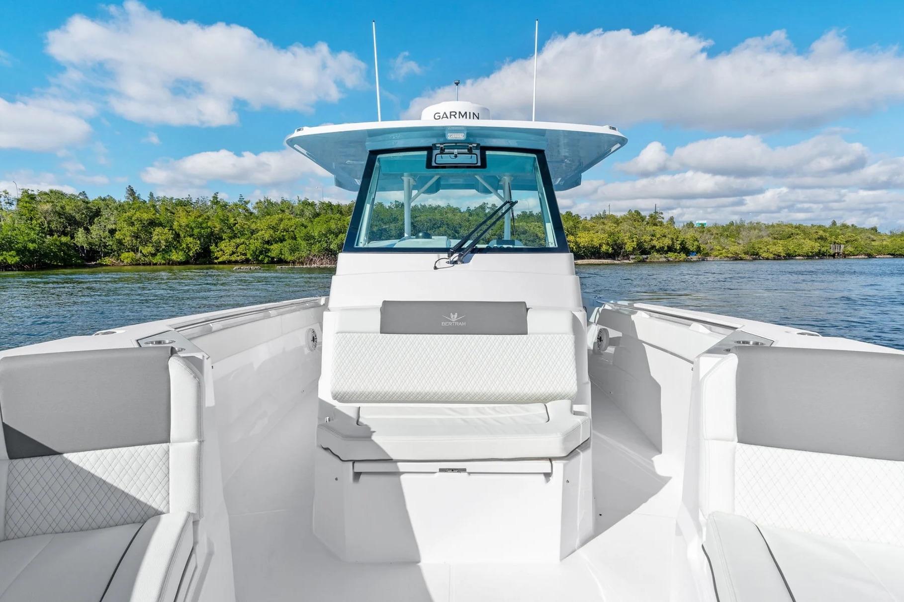 Manufacturer Provided Image: 2026 Bertram 34 CC boat on water, featuring sleek design and modern seating.