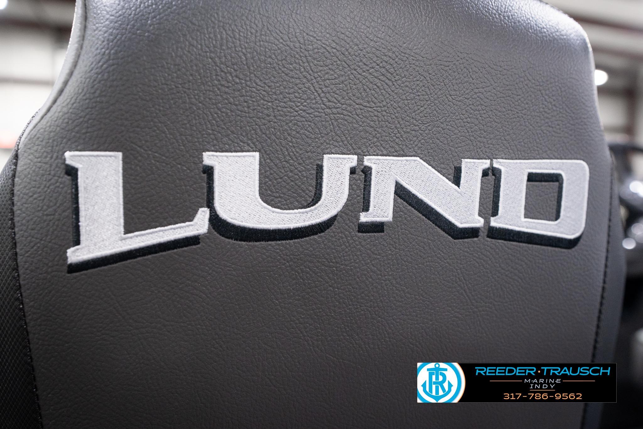 Close-up of Lund 1775 Impact XS SS 2026 boat seat with logo.
