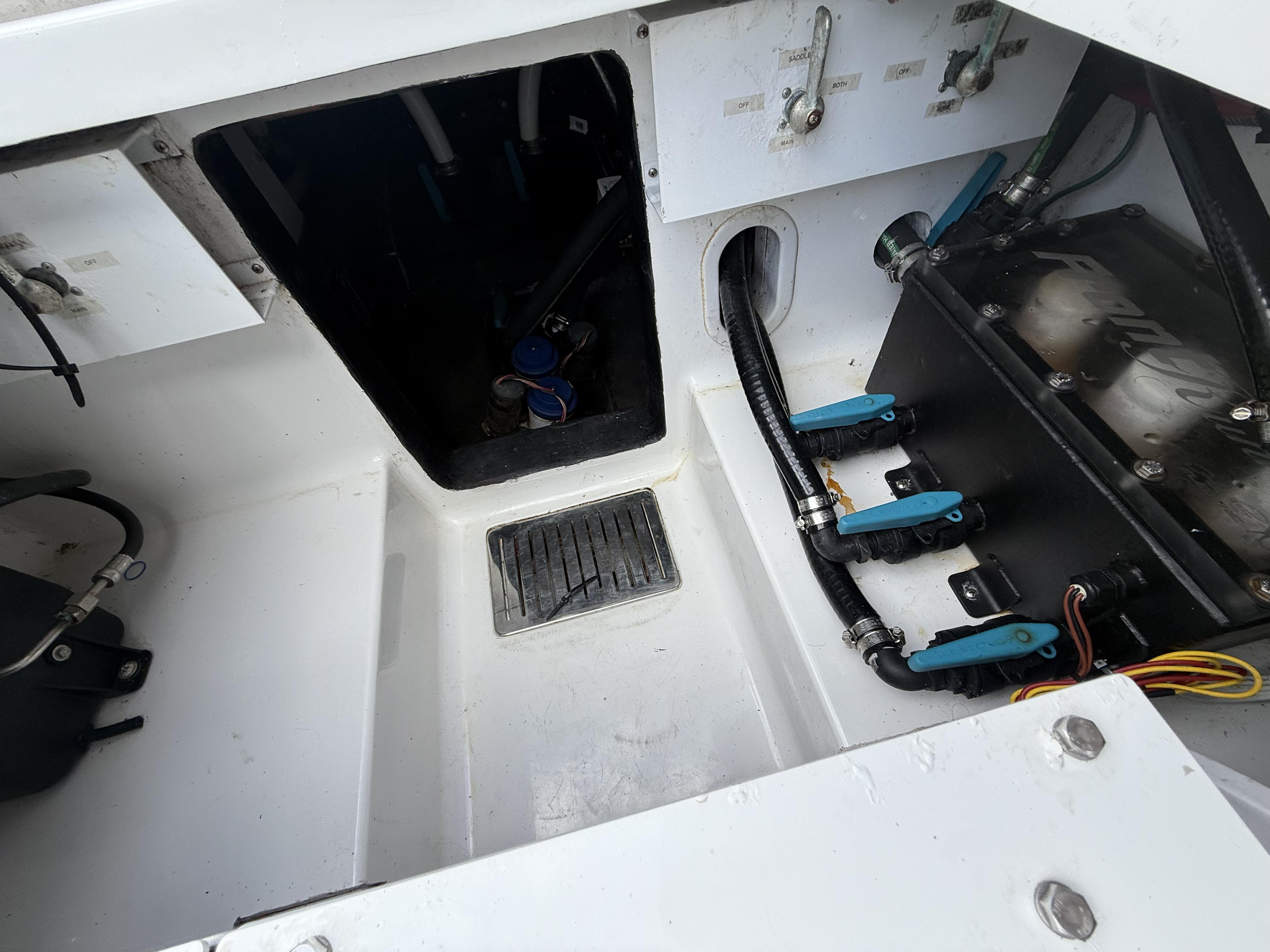 2024 Front Runner 39 CC boat interior showing mechanical components and wiring.
