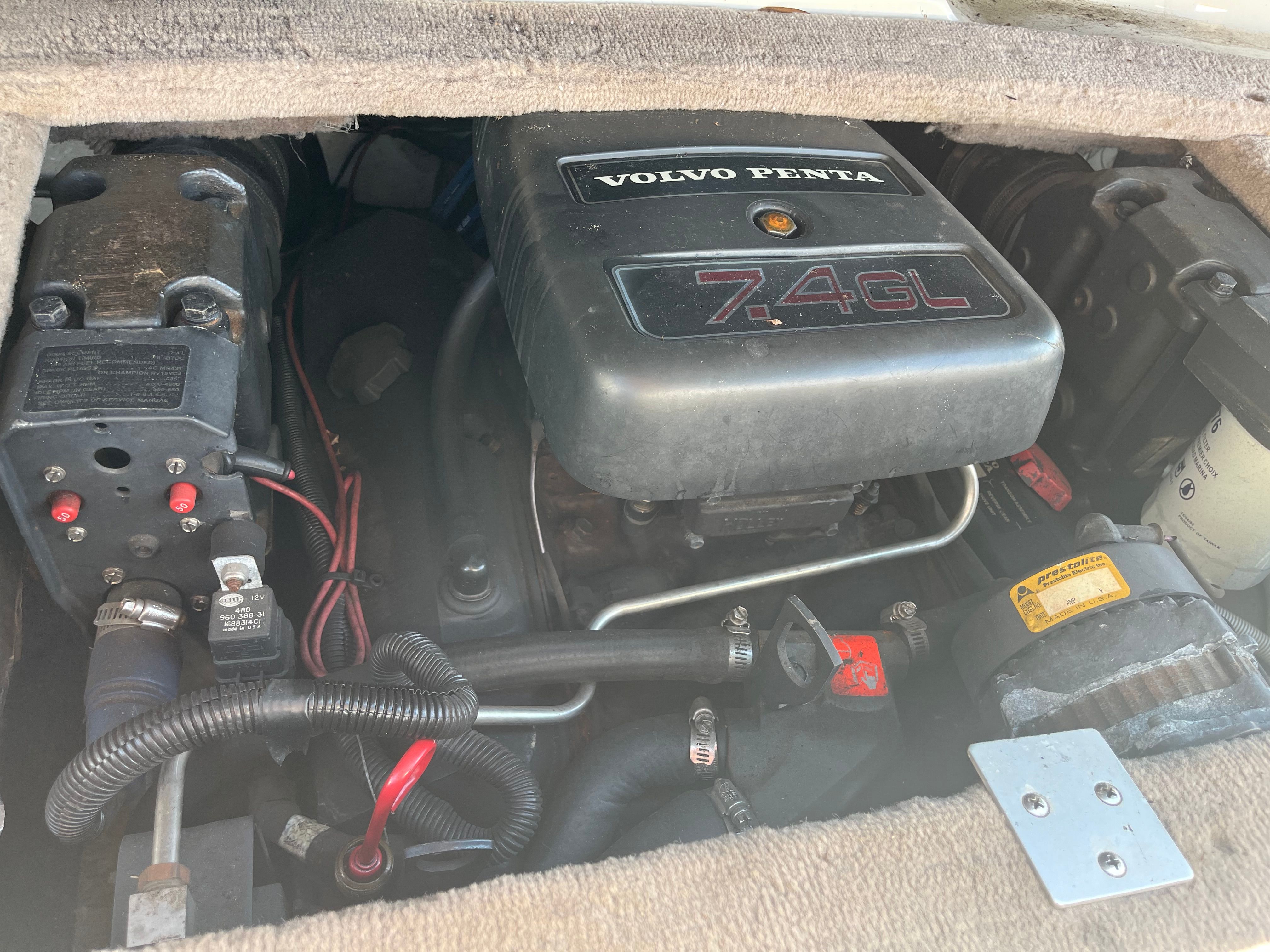 Engine compartment of a 1996 Crownline 202 BR with a Volvo Penta 7.4GL engine.