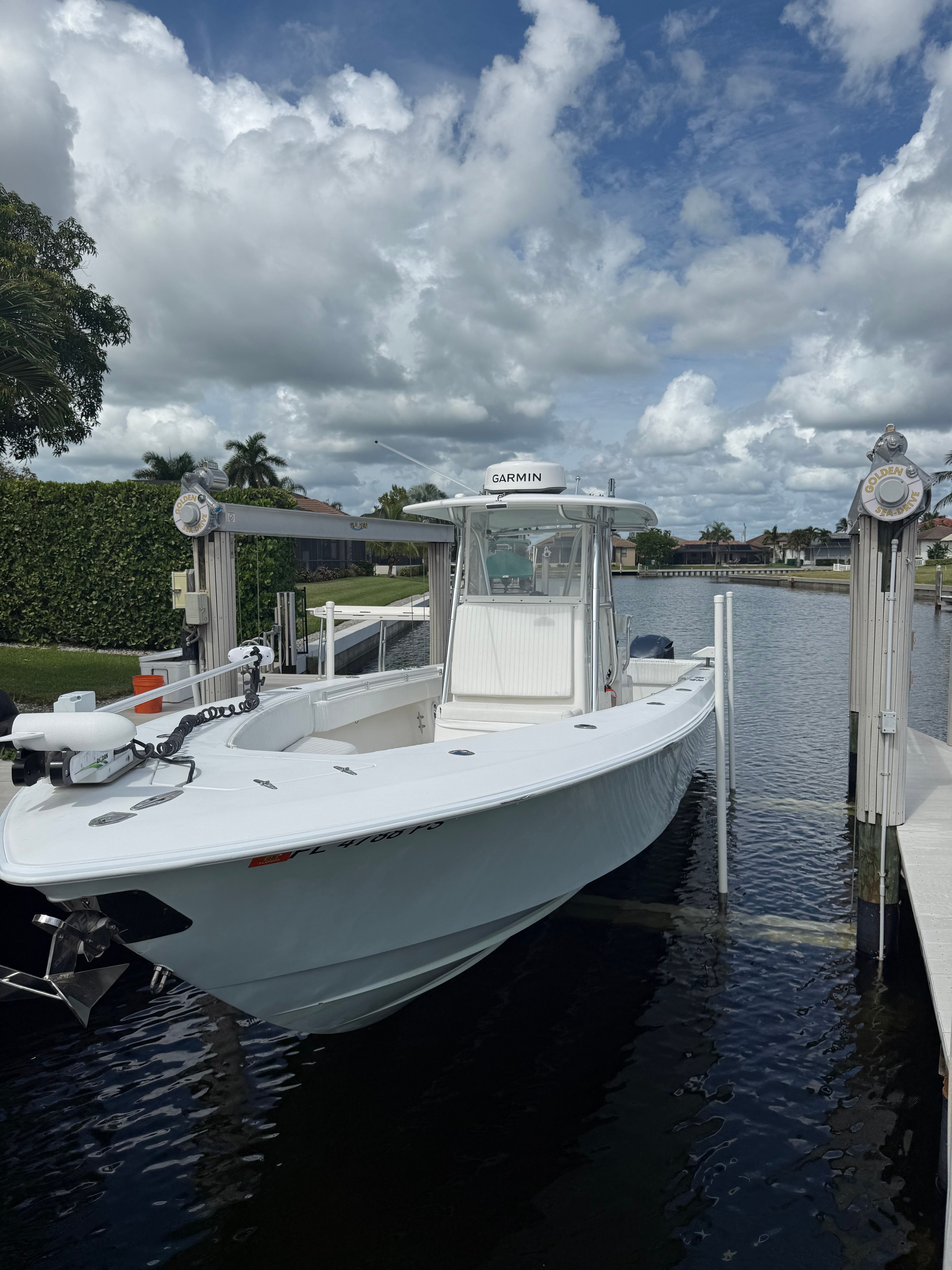 2012 Contender 32 ST boat docked with Garmin equipment.