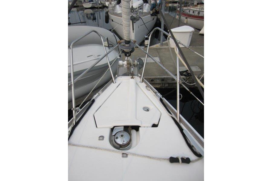 2008 Jeanneau Sun Odyssey 39i sailboat bow at marina dock.