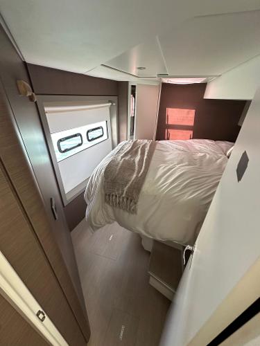 2021 Bali 4.8 interior bedroom with cozy bed and modern design.
