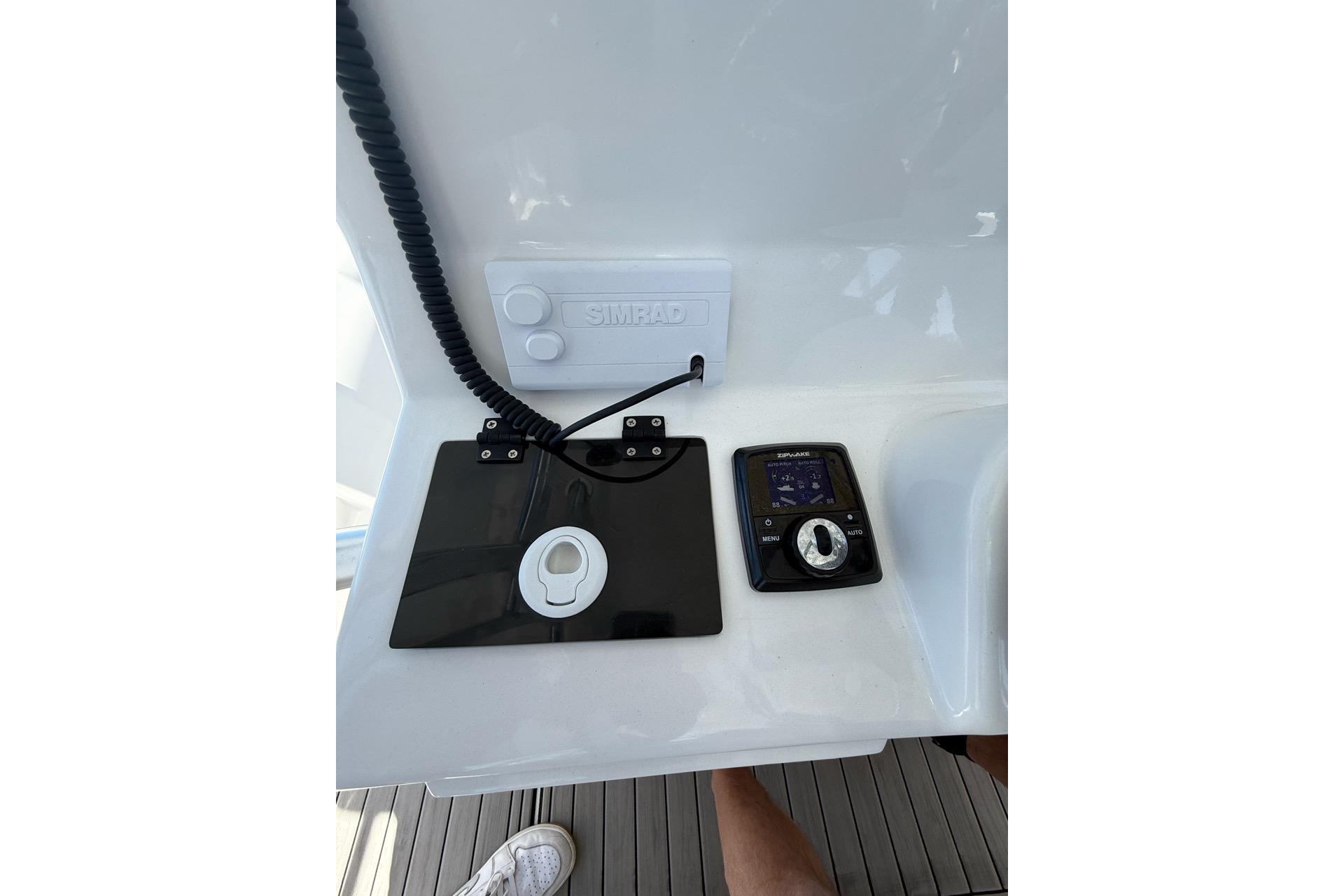 Control panel of 2021 Custom Infusion 34 CC boat with Simrad equipment.