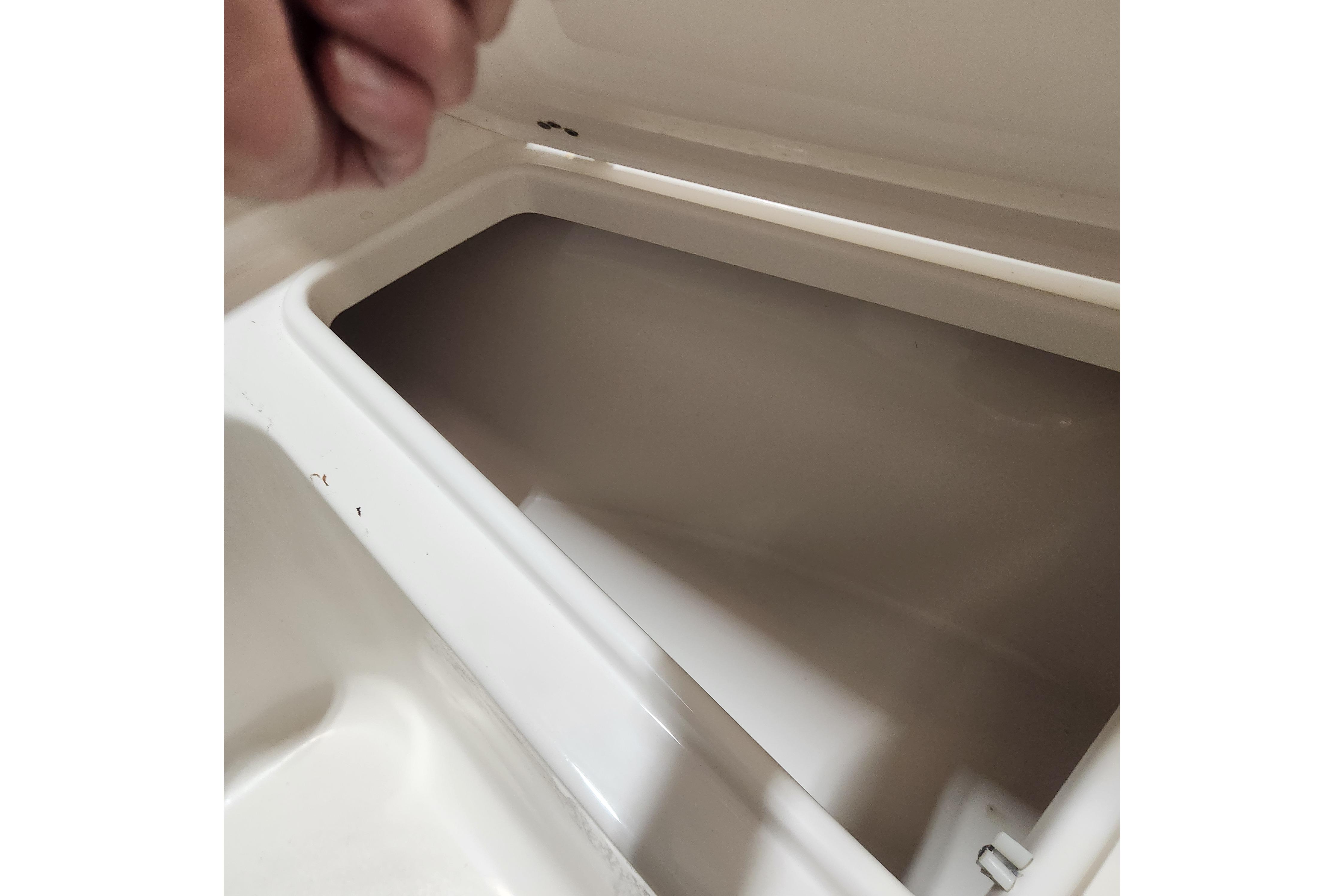 Open storage compartment in 2023 Key West 219 FS boat.