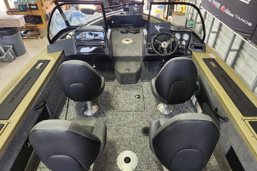 2026 Tracker Targa 185 WT boat interior with four seats and steering console.