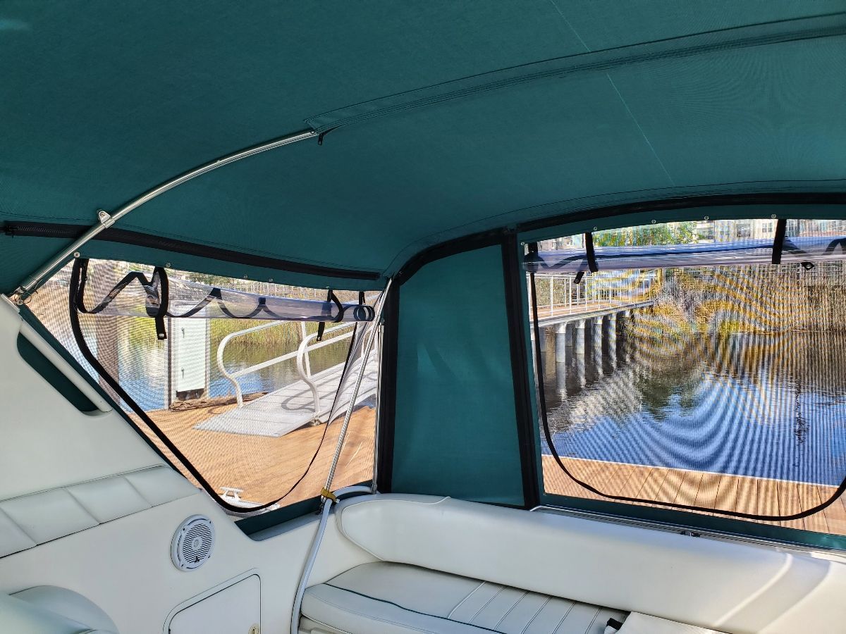 Interior view of a Sea Ray Sundancer 330 overlooking the dock.