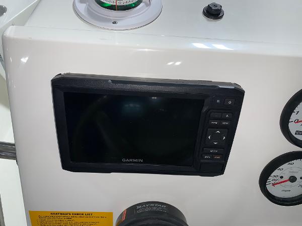 Garmin display on 2026 Key West 188 Bay Reef boat dashboard with gauges.