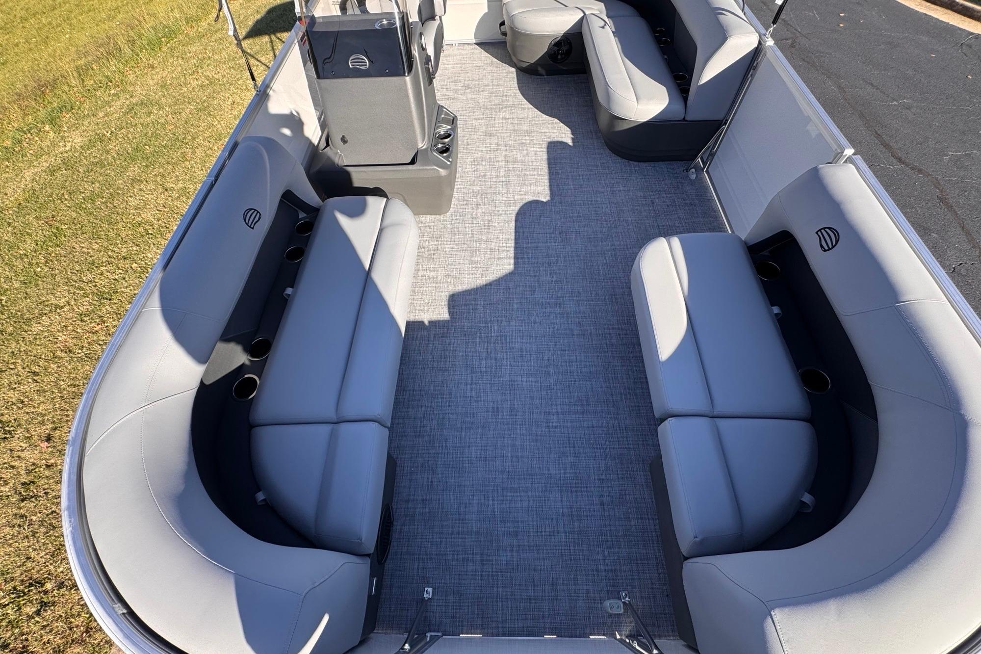 2026 Sun Tracker Party Barge 16 DLX interior with spacious seating and modern design.
