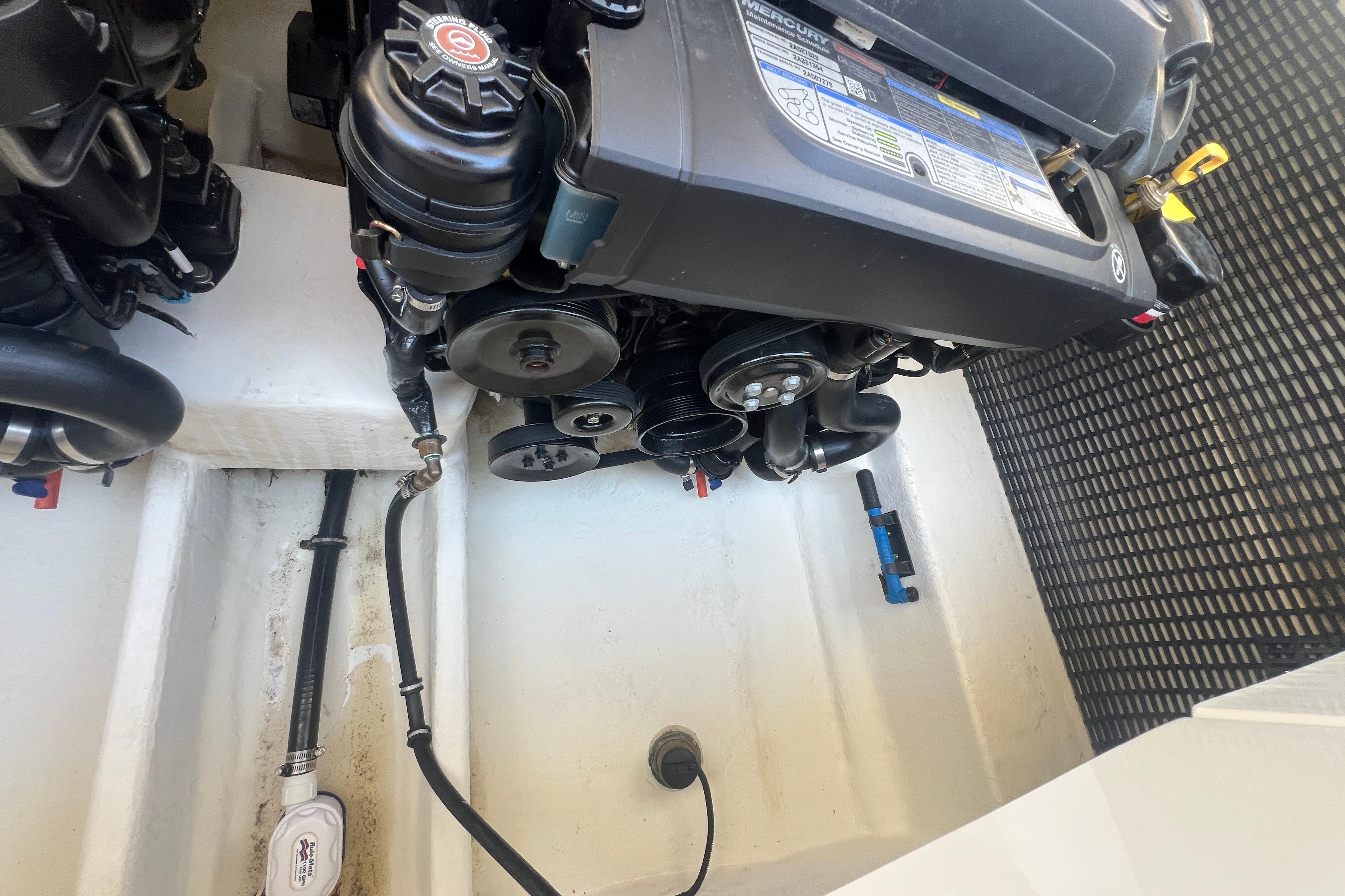 Engine compartment of a 2017 Monterey 298SS Super Sport boat, showcasing mechanical components.