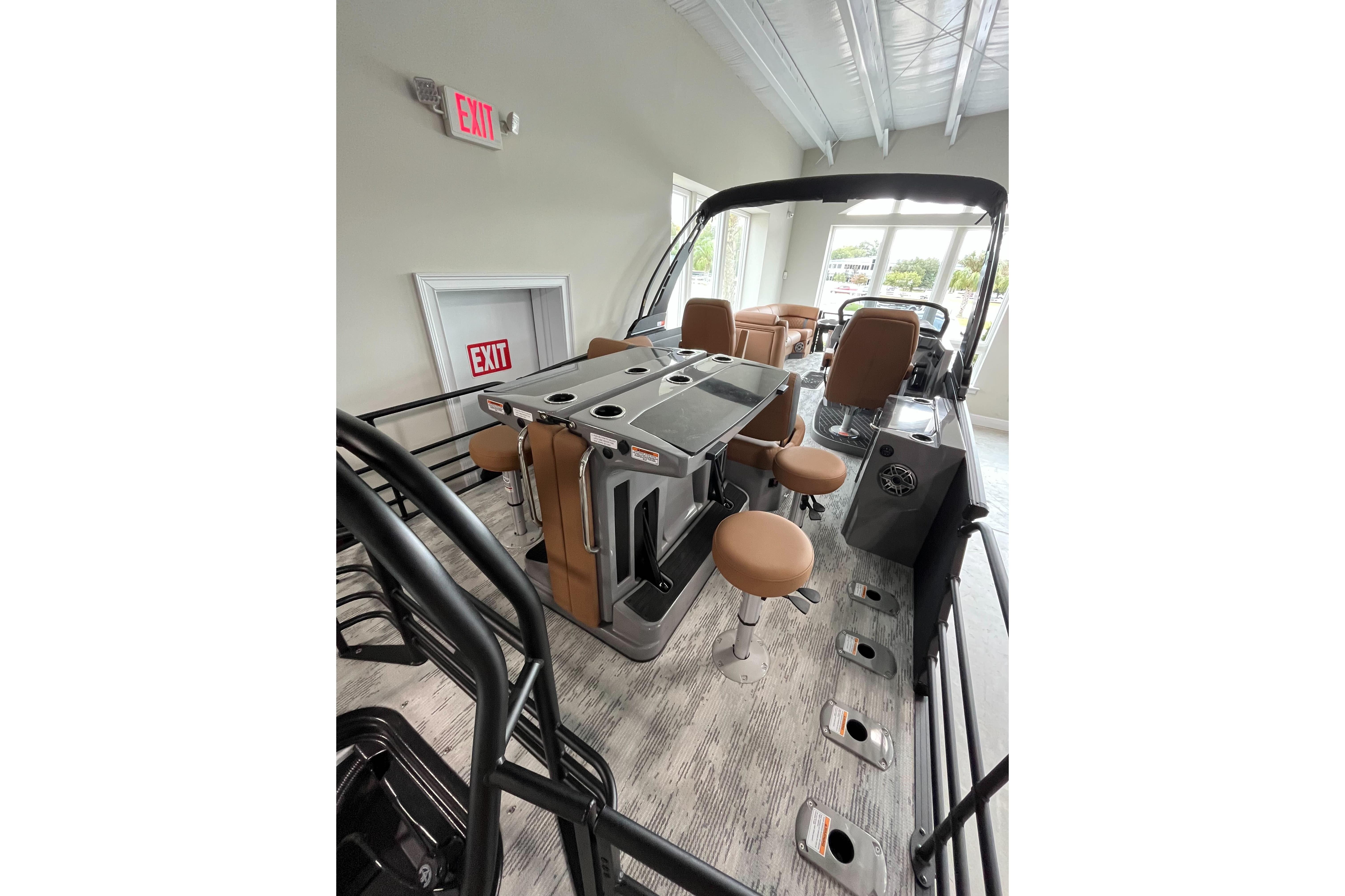 2026 Starcraft RX 25 DL DC boat interior with seating and control panel.