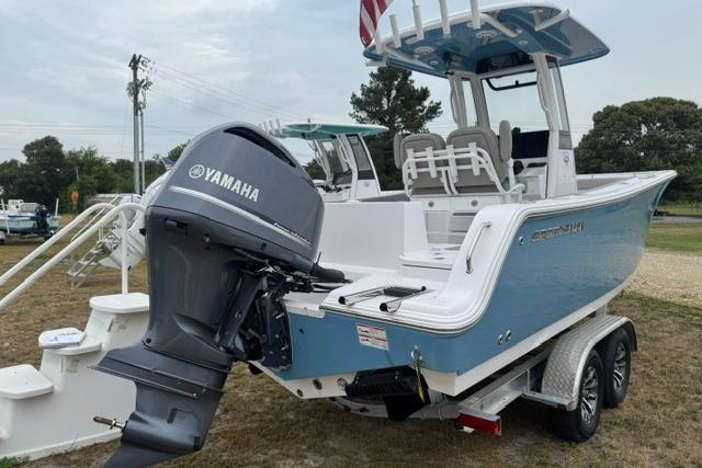 2026 Sportsman Heritage 231 Center Console boat with Yamaha engine on trailer.