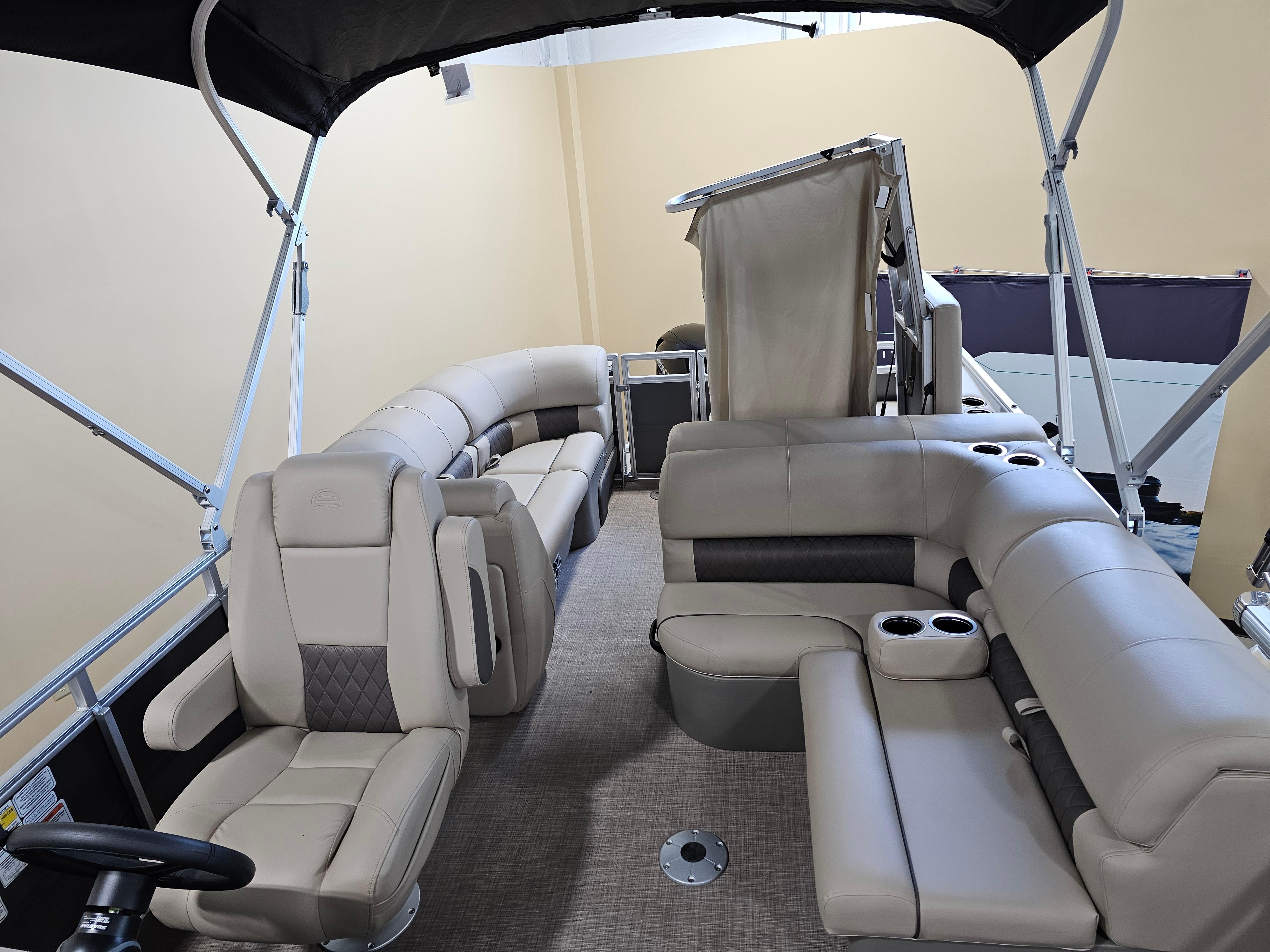 2024 Sun Tracker Party Barge 22 RF XP3 interior with plush seating and cup holders.