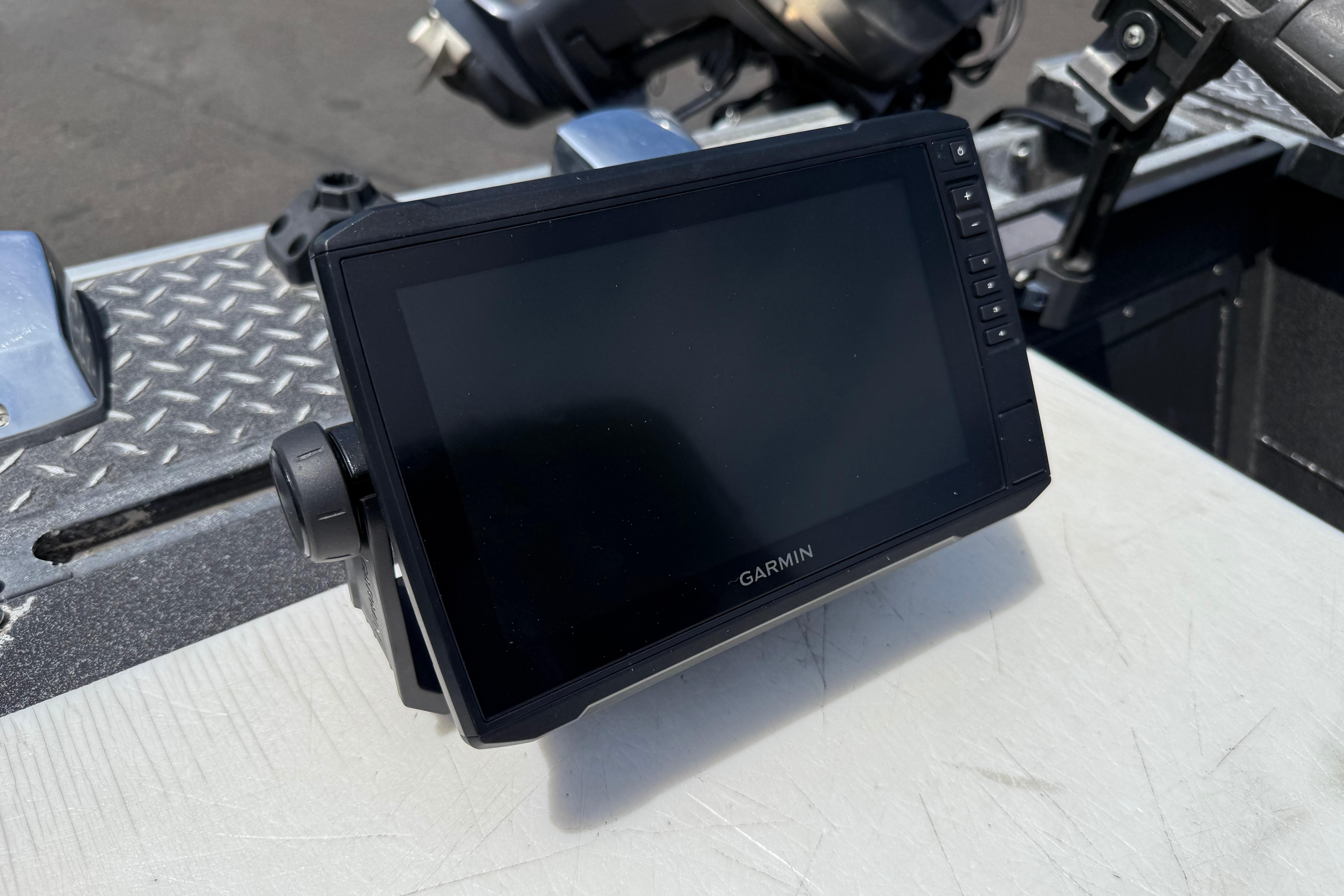 Garmin GPS device mounted on a 2005 Willie Raptor 21' boat dashboard.