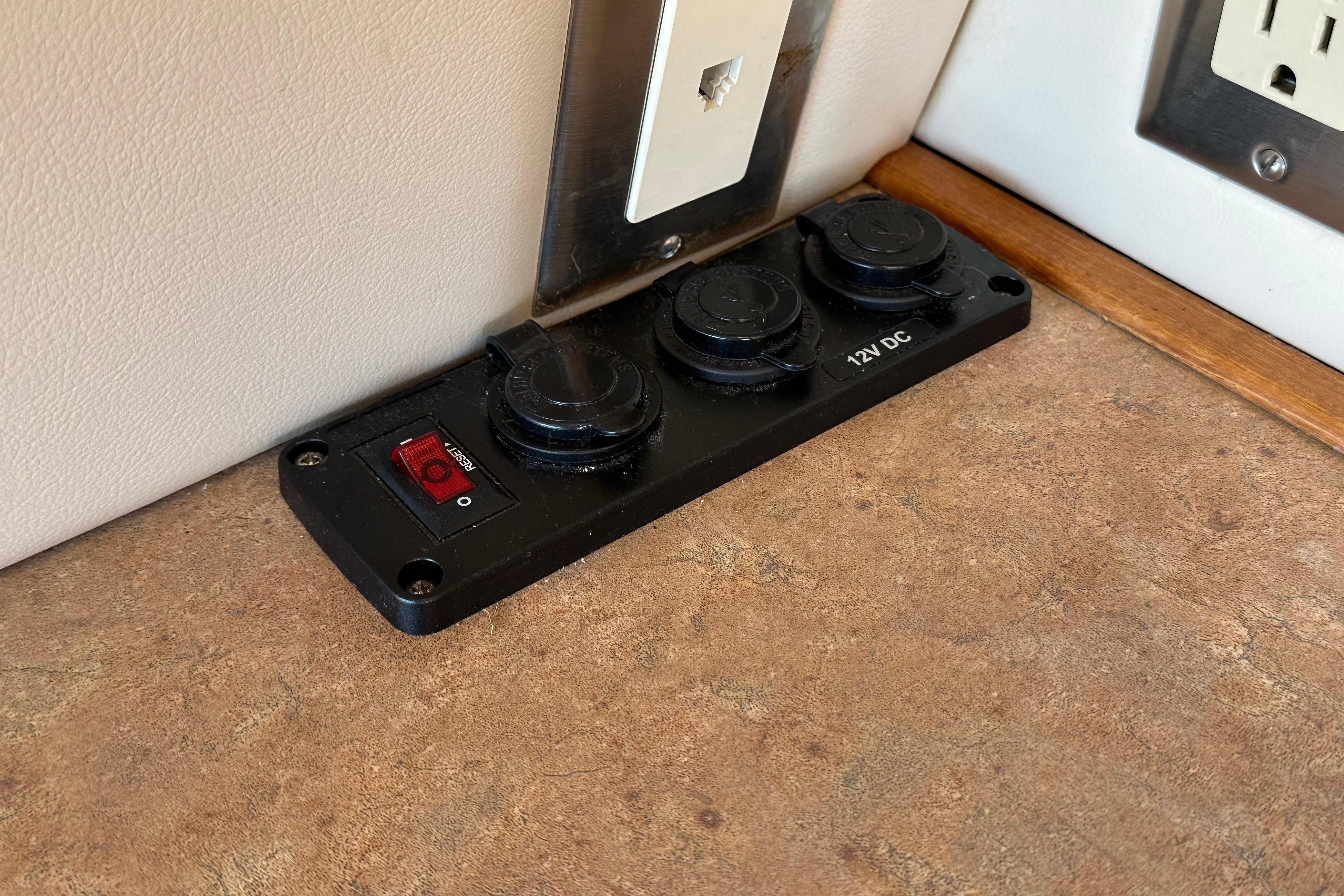 12V DC power outlet panel on 2000 Bayliner 4087 Aft Cabin Motoryacht.