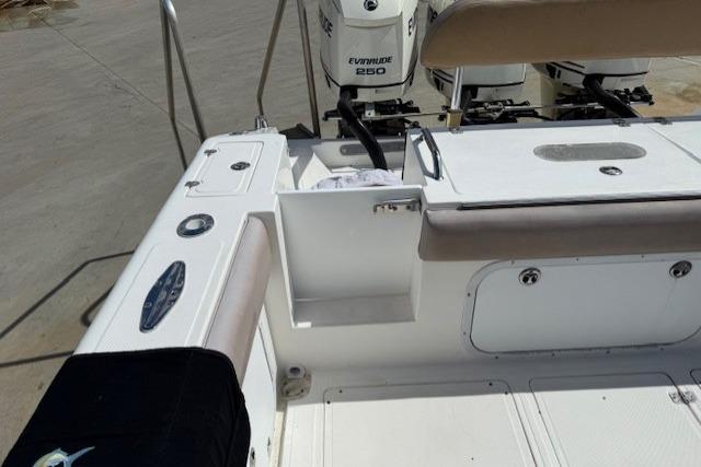 2005 Dakota 36 CC Forward Cuddy Cabin boat deck with Evinrude 250 engines.