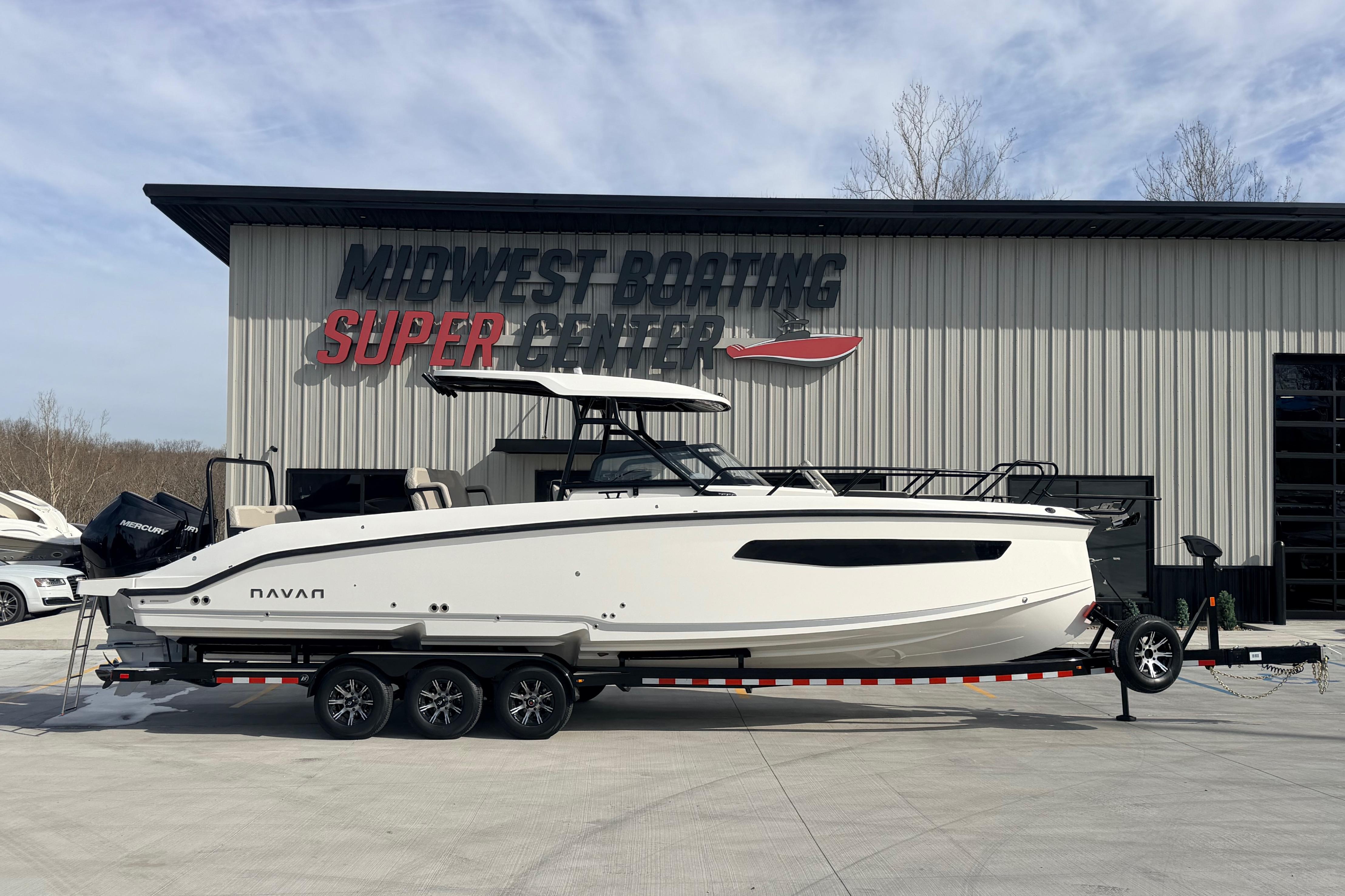 2026 Navan S30 boat on trailer at Midwest Boating Super Center.