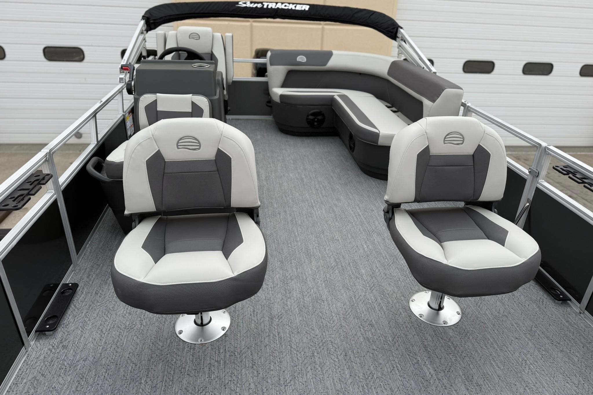 2026 Sun Tracker Bass Buggy 16 XL Select pontoon boat interior with gray seating.