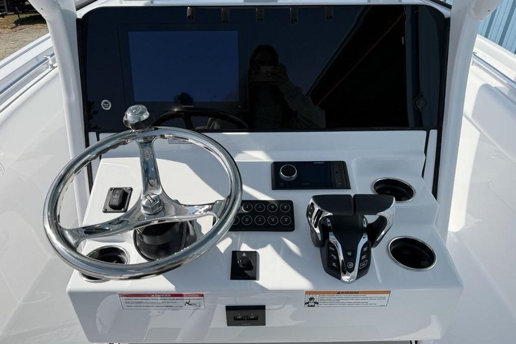 2026 Sportsman Open 252 Center Console dashboard with steering wheel and controls.
