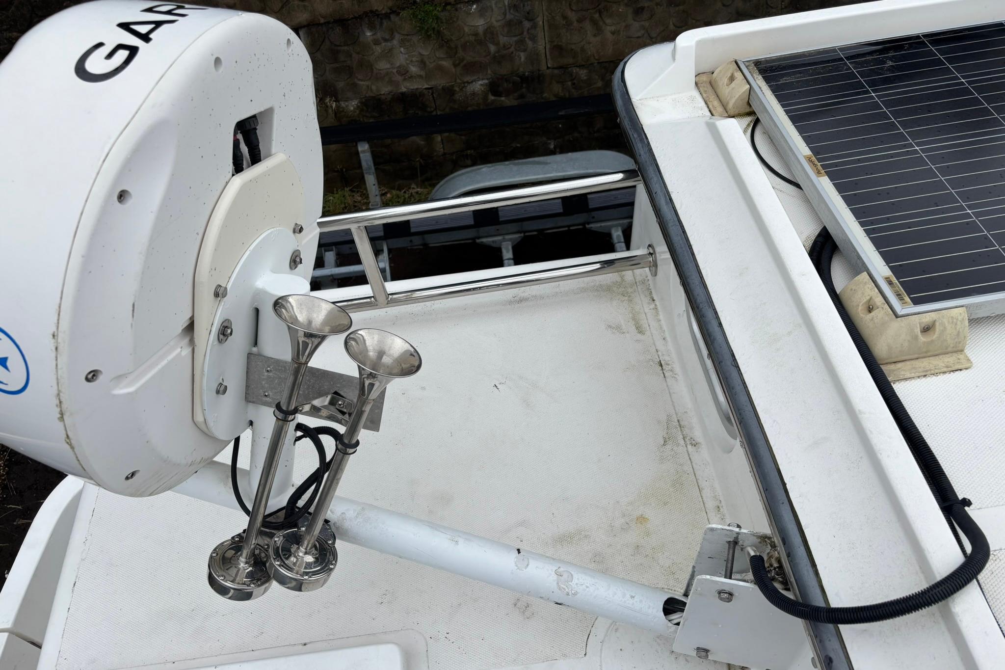 Radar and solar panel on 2020 SeaPiper 35 boat deck.