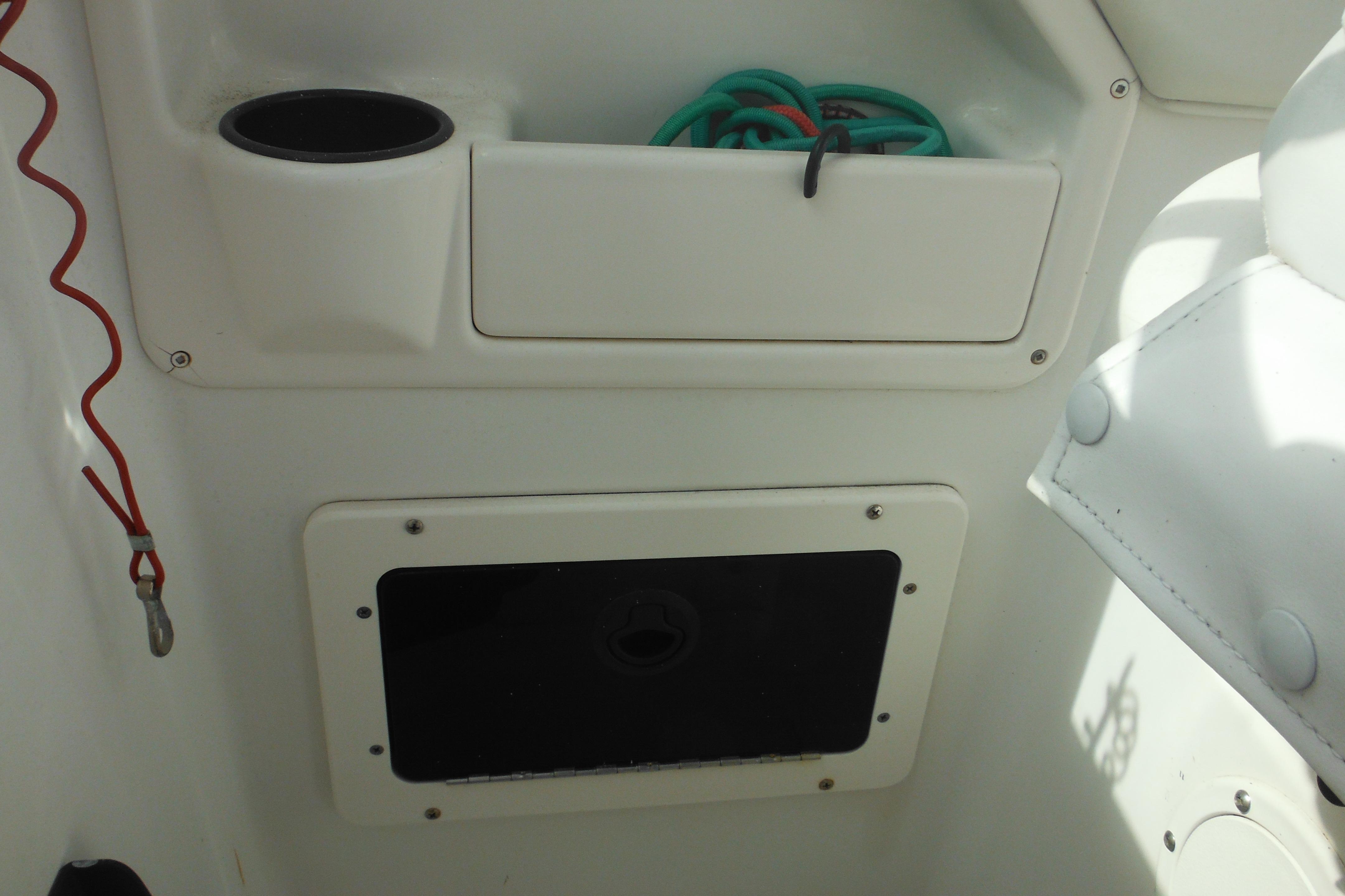 Interior view of a 2005 Seaswirl Striper 2101 Walkaround O/B boat compartment.