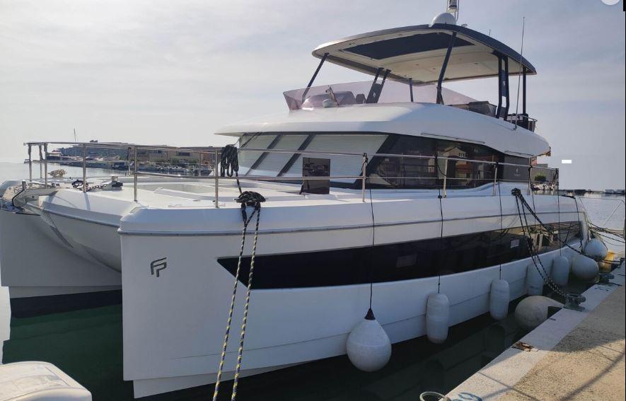 Fountaine Pajot Motor Yacht 44, 2021 model, docked at harbor.