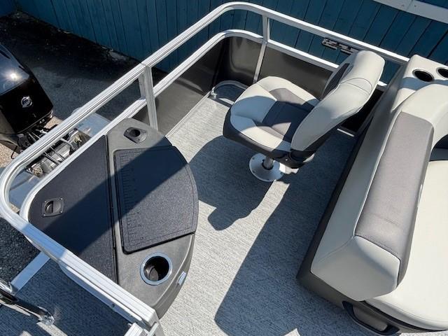 2026 Sun Tracker Bass Buggy 18 DLX interior with seating and fishing station.