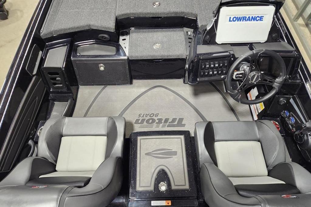 2026 Triton 20XP Patriot boat interior with dual seats and Lowrance electronics.