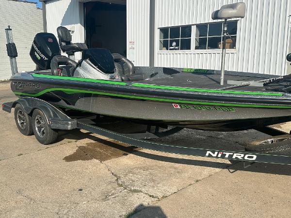 2017 Nitro Z21 Z-Pro High Performance boat on trailer, parked outside a garage.