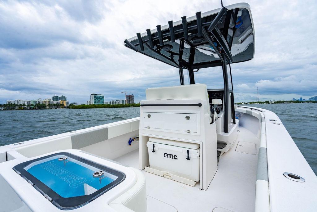 2027 Reef Runner 280 boat on water, featuring sleek design and modern amenities.