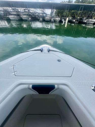 2008 SeaVee 390B boat bow view at marina with calm water.