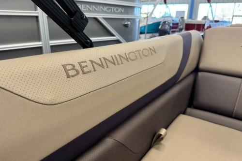 2026 Bennington 22SXSB boat interior with branded seating in showroom.