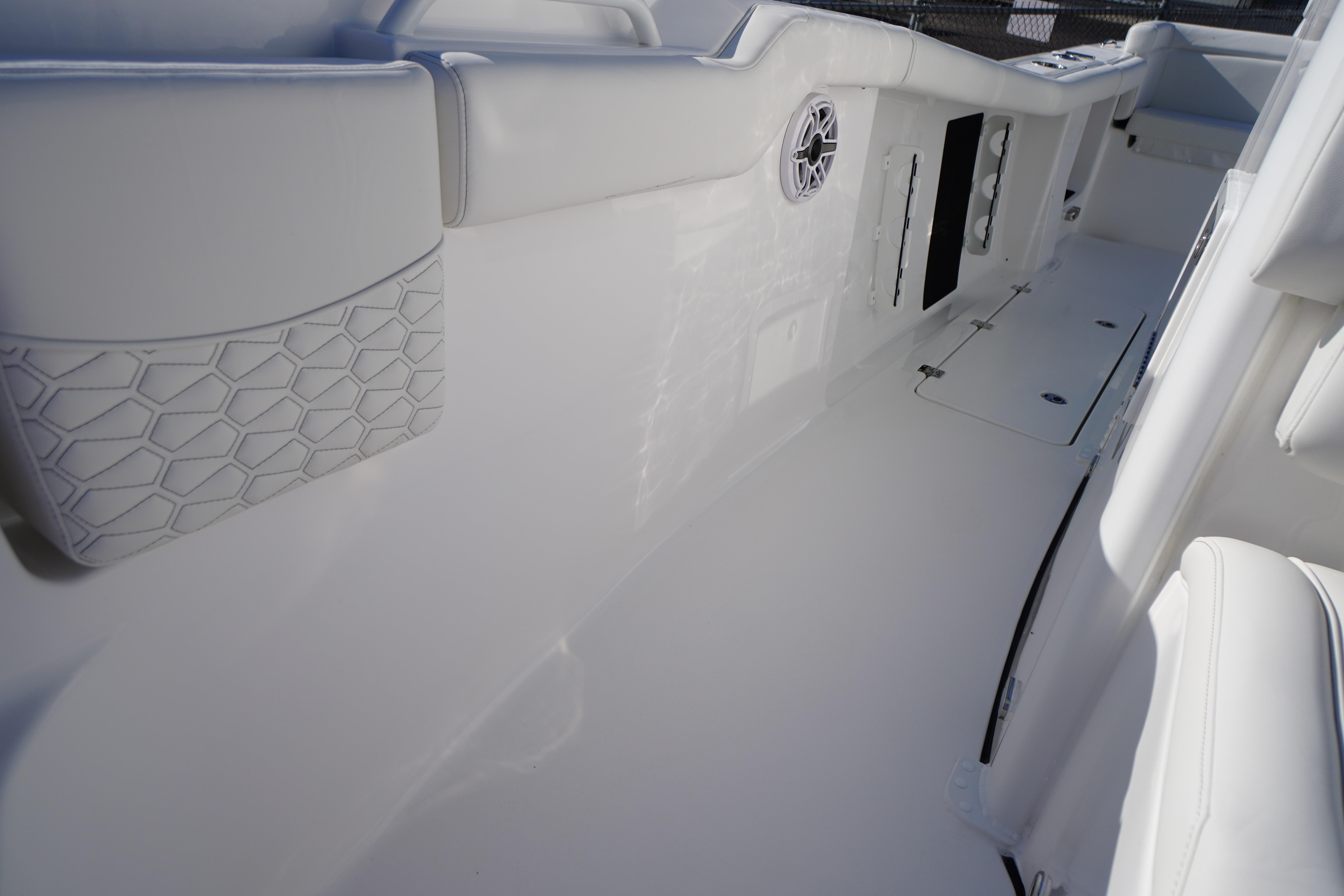 2026 Tidewater 272 LXF boat interior with white seating and modern design.