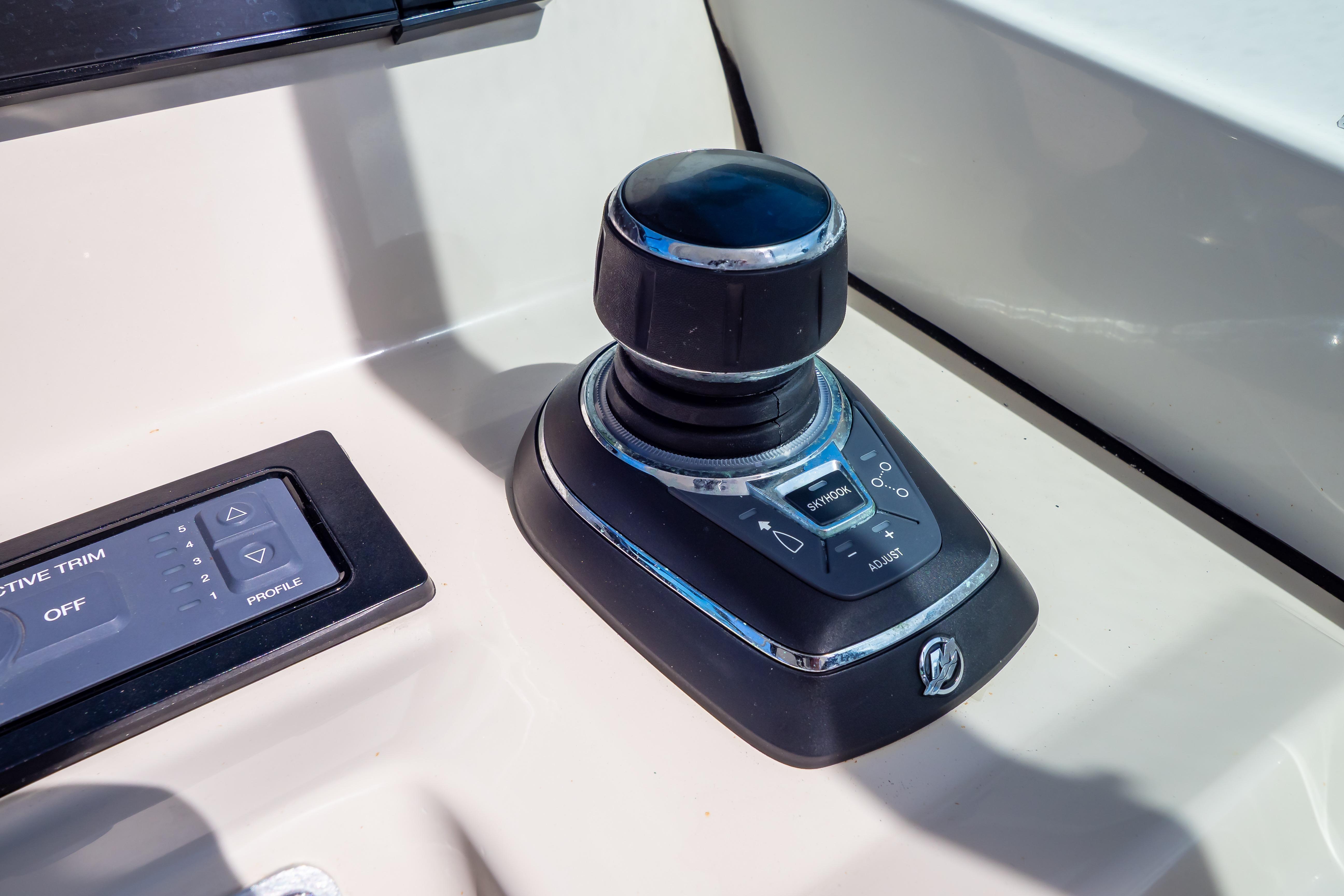 Joystick control on 2019 Boston Whaler 270 Vantage boat dashboard.