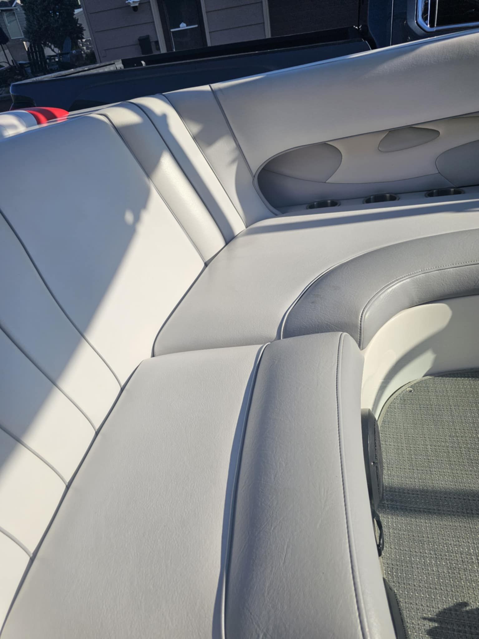 Interior of a 2006 MB PIGPR with gray leather seats.