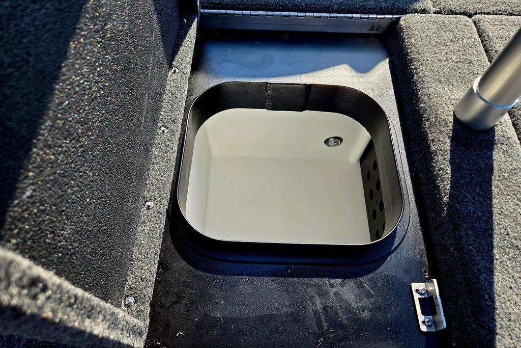 2026 Skeeter ZXE20 boat storage compartment with open hatch, showcasing interior details.