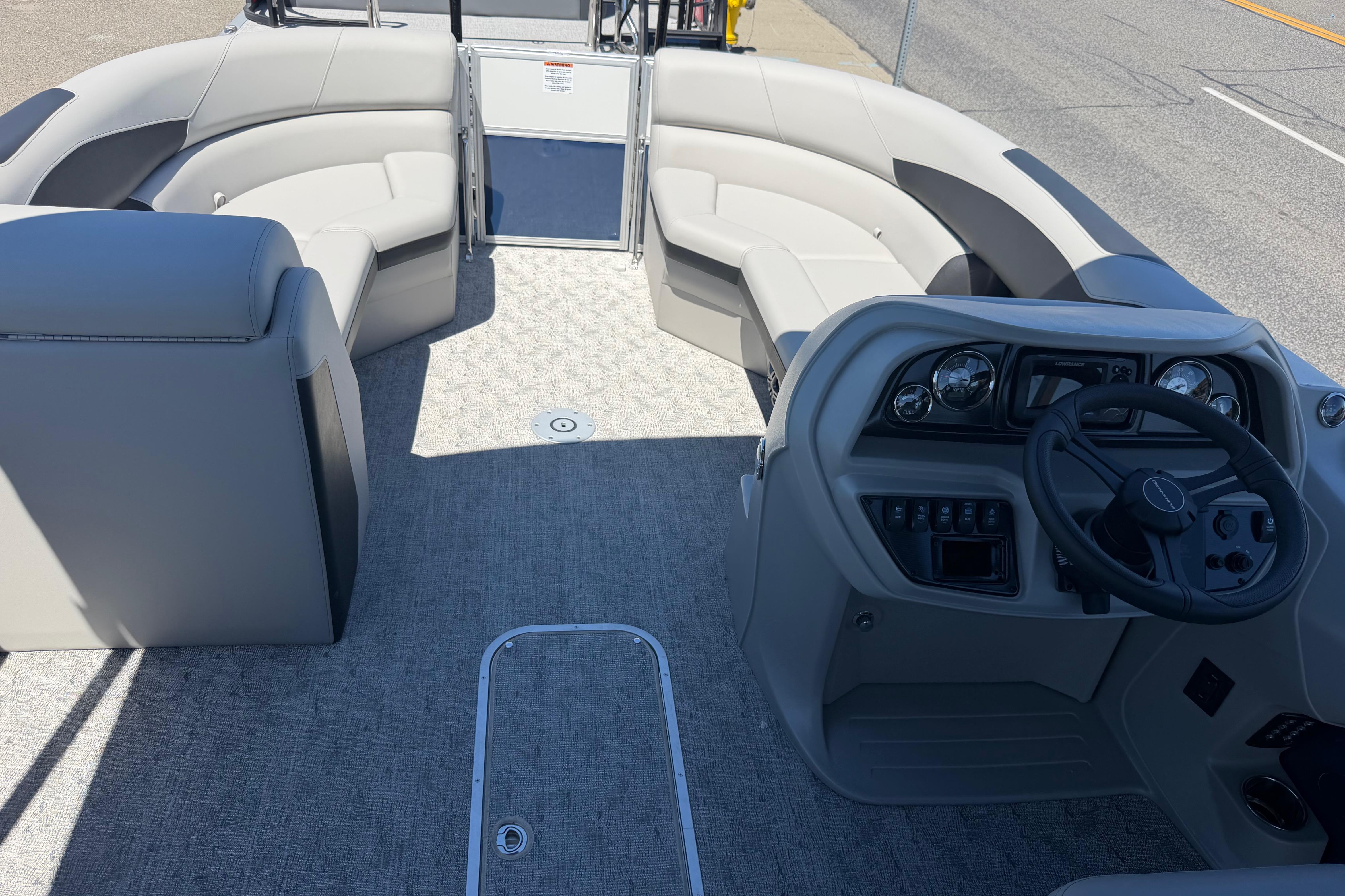 2026 Berkshire LE 24' Ultra Lounger boat interior with modern helm and spacious seating.