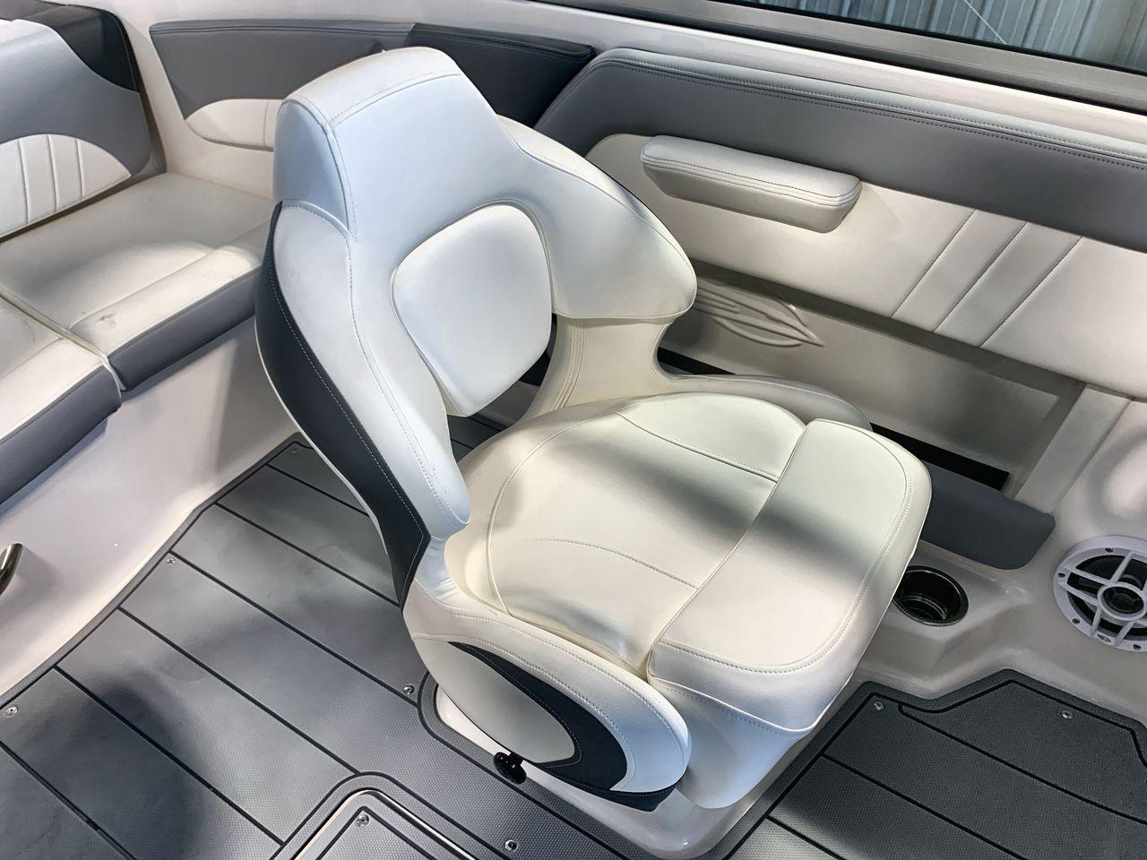 2025 Chaparral 21 SSi boat interior with white seating and modern design.